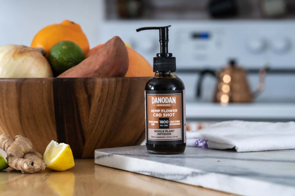 Danodan water-soluble CBD hemp flower infusion on a kitchen counter