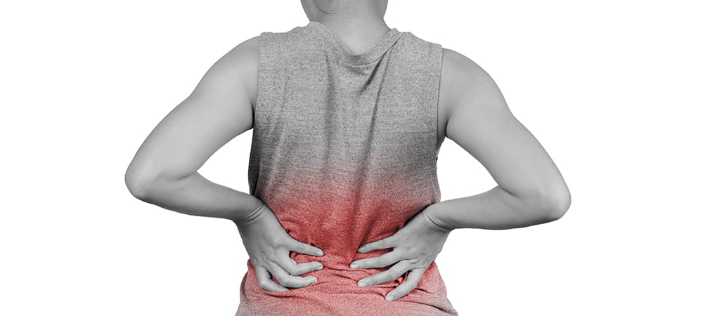 Person with signs of lower back pain. cbd oil for back pain. cbd for back pain. buy organic hemp cbd oil.